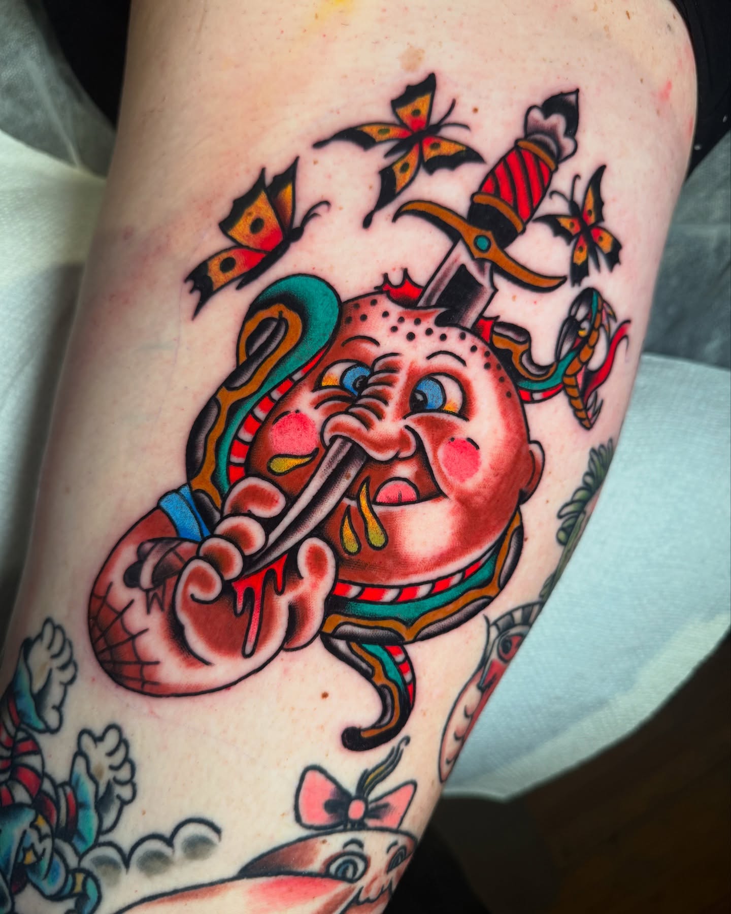 Clown smoking pipe American traditional tattoo on the forearm by πππ’π―π’π¨ πππΆπ©π¬π―π, Manchester, New Hampshire