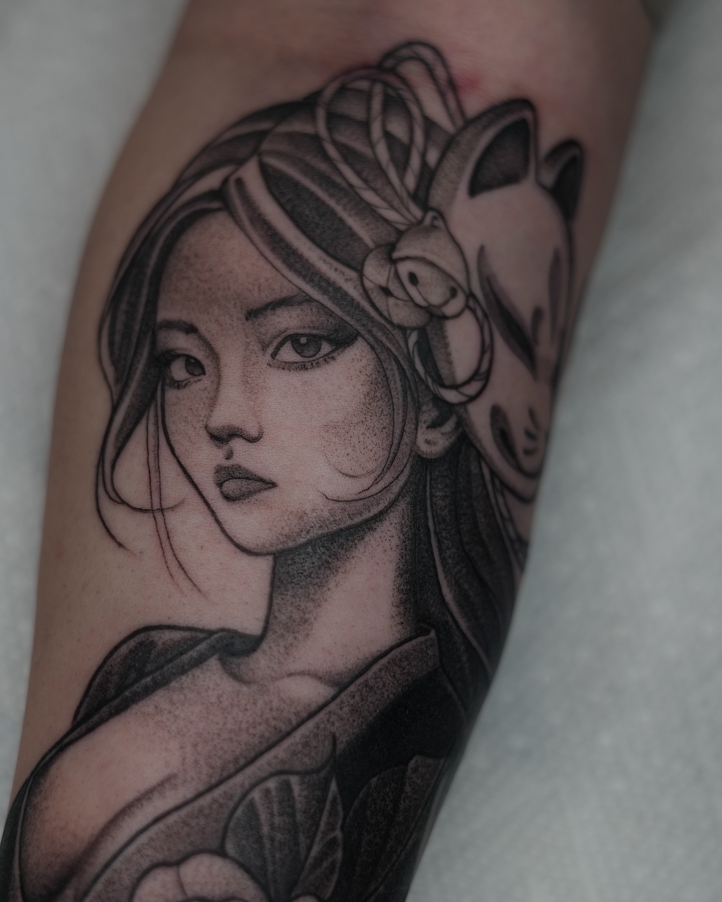 Woman with fox ears dotwork tattoo on the forearm by Joe Cruz