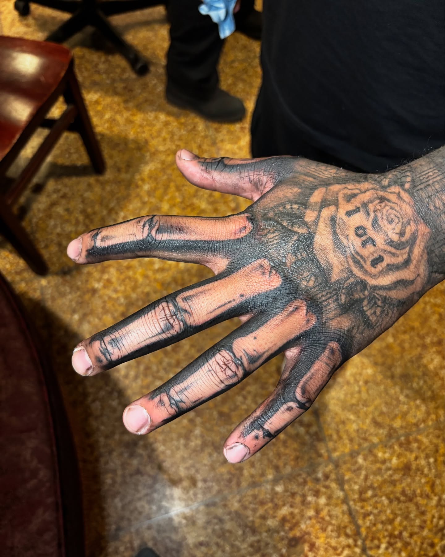 Hand black and grey tattoo on the hand by Dyllan Shipley