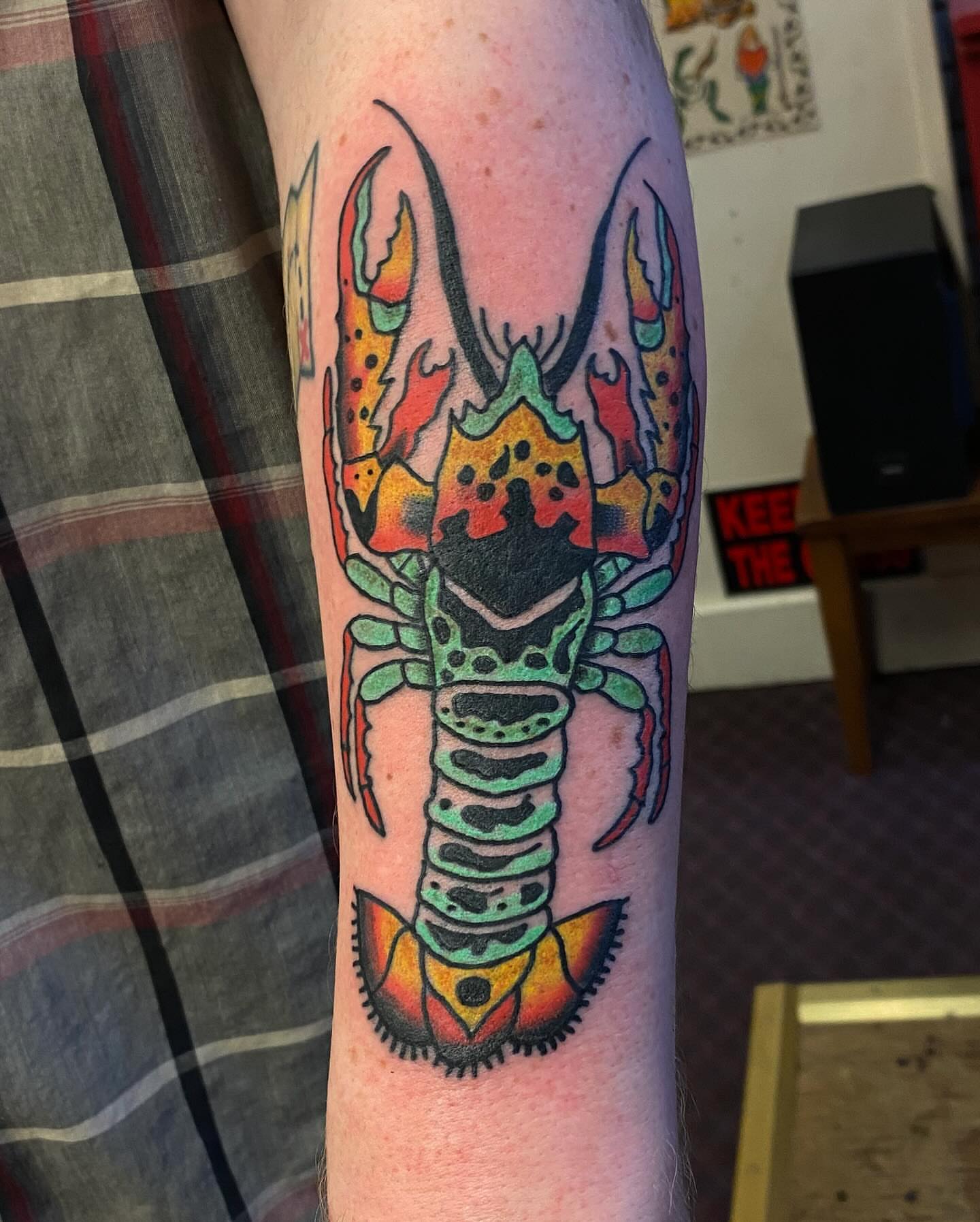 Lobster American traditional tattoo on the forearm by Tommy O'Connell
