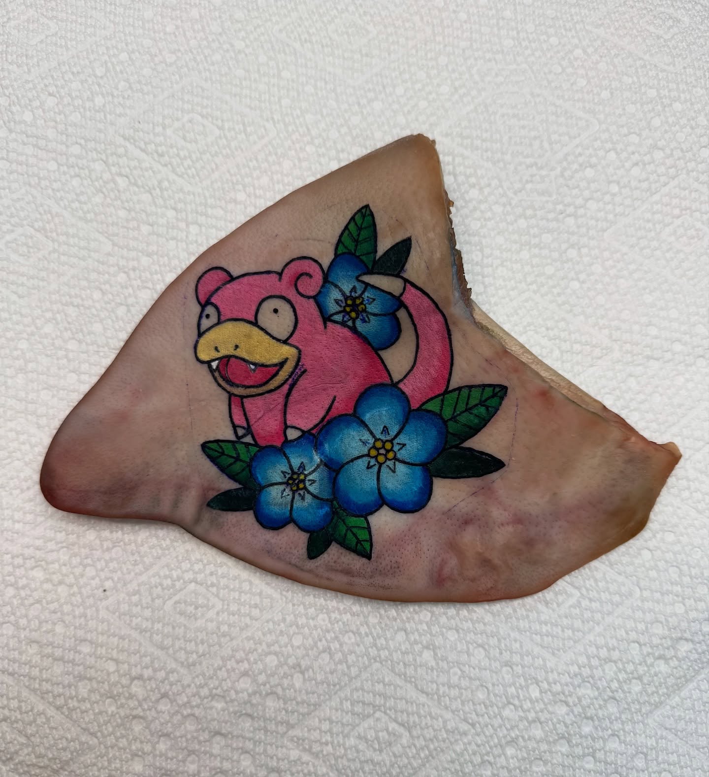 Psyduck with flowers new school tattoo by Minxxy Tattoos
