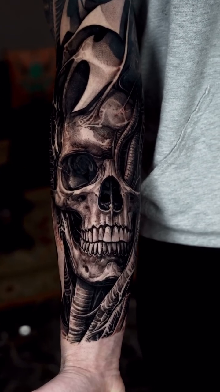 Biomechanical skull sleeve realism tattoo by Jake Ross, Mentor, Ohio