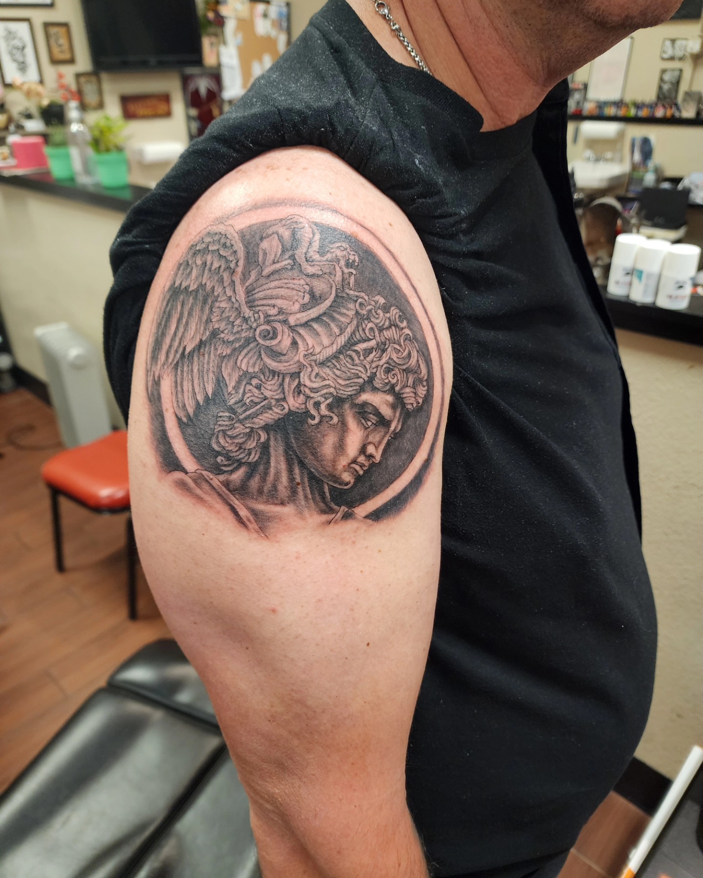 Medusa realism tattoo on the shoulder by Jeff Frederick
