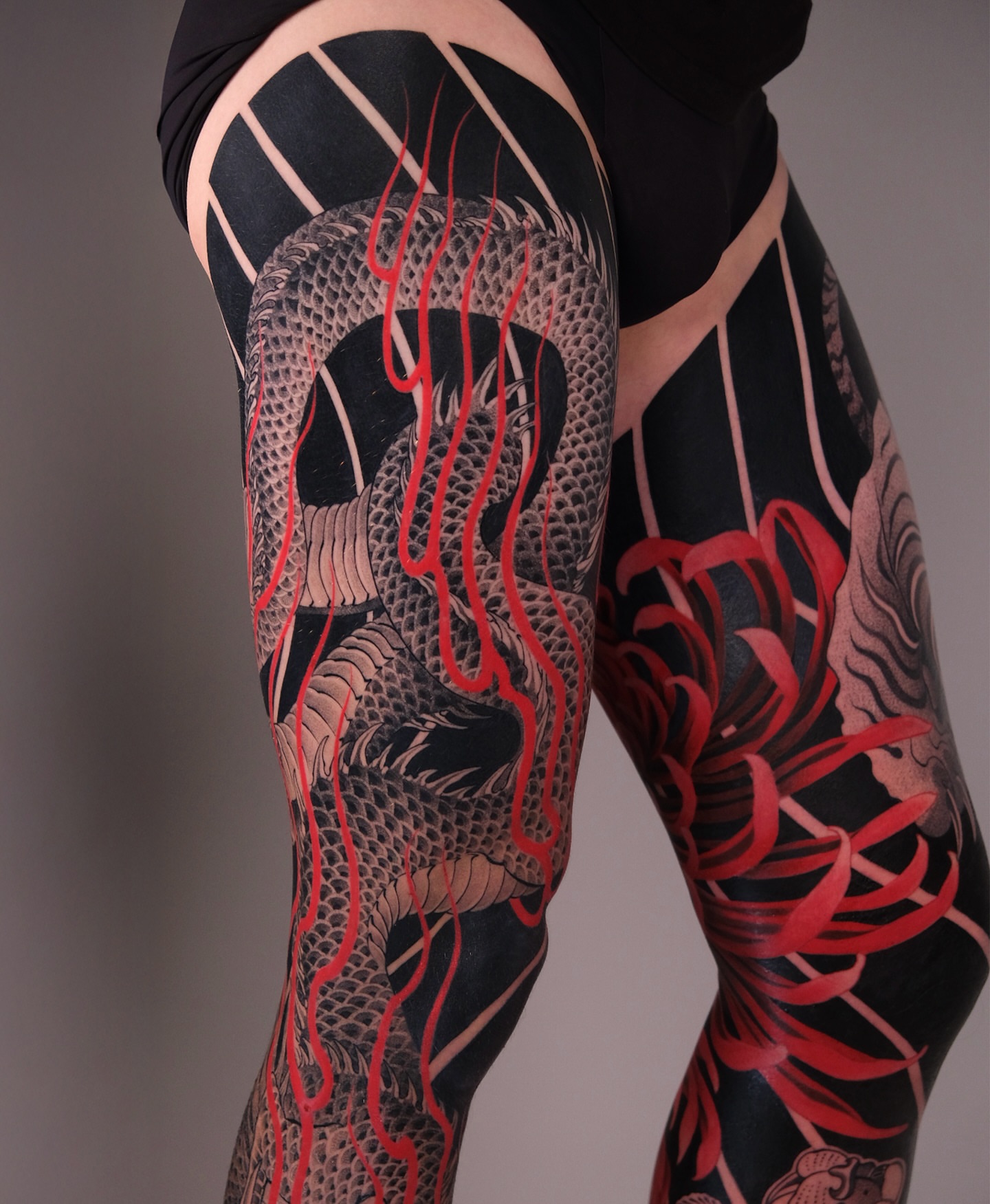 Dragon and chrysanthemum japanese irezumi tattoo on the leg by bayun.tattoos