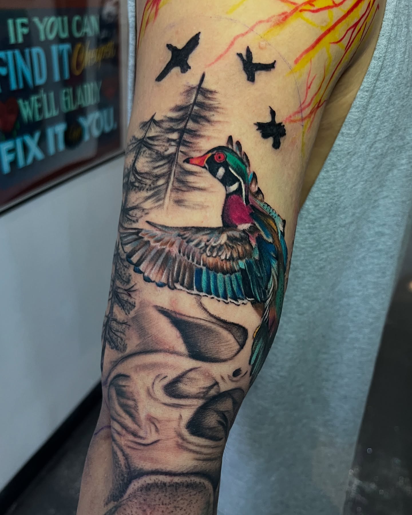 Wood duck realism tattoo on the forearm by Jacob Sass