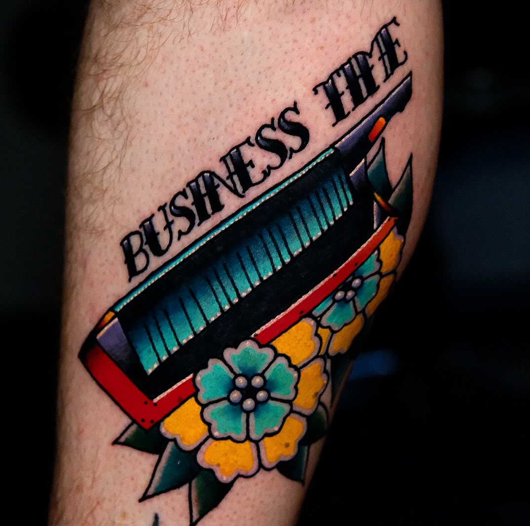 Keyboard American traditional tattoo on the forearm by Don Boos Tattoos