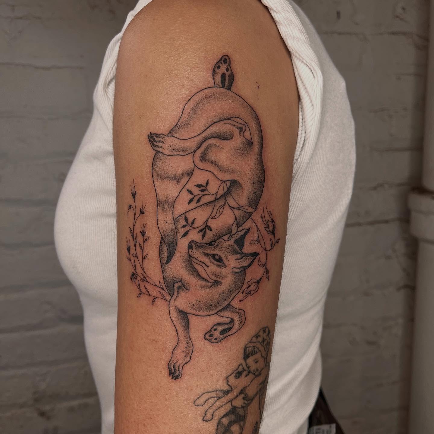 Cat and snake realism tattoo on the forearm by 𝔇𝔢𝔰𝔦