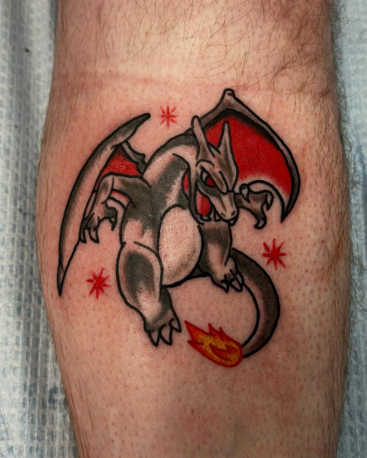 Dragon American traditional tattoo on the forearm by Olive Kelley