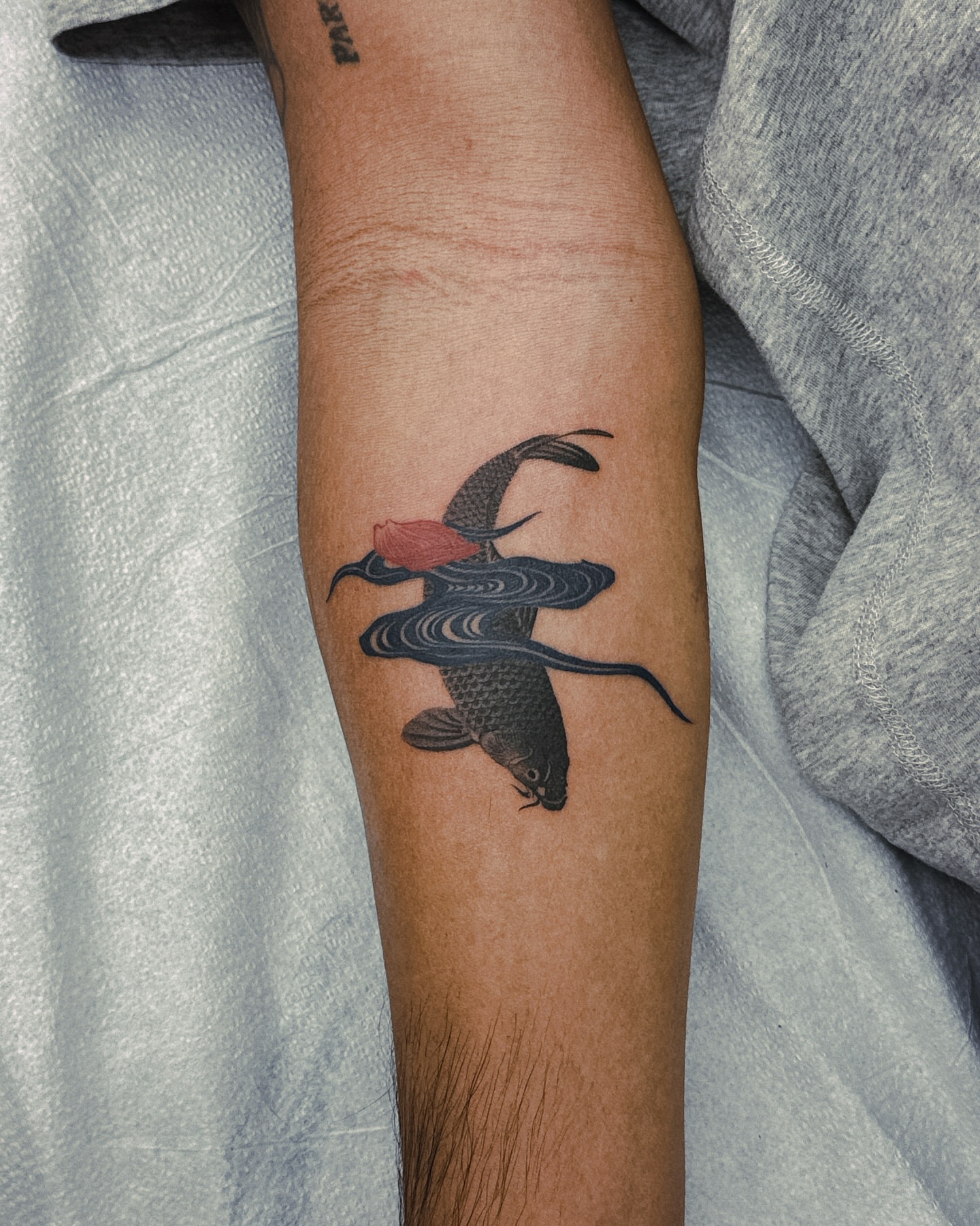 Koi fish japanese irezumi tattoo on the forearm by 비단, New York, New York