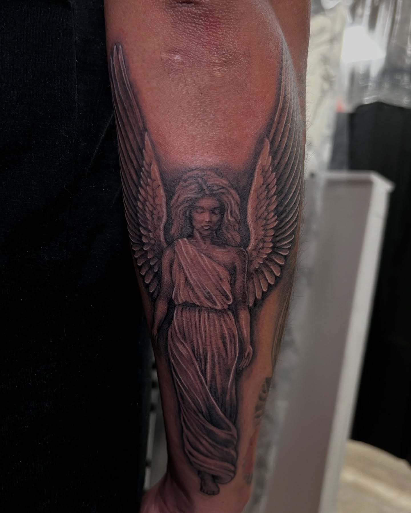 Angel realism tattoo on the forearm by tatman cris 🥀 dfw tattoo artist
