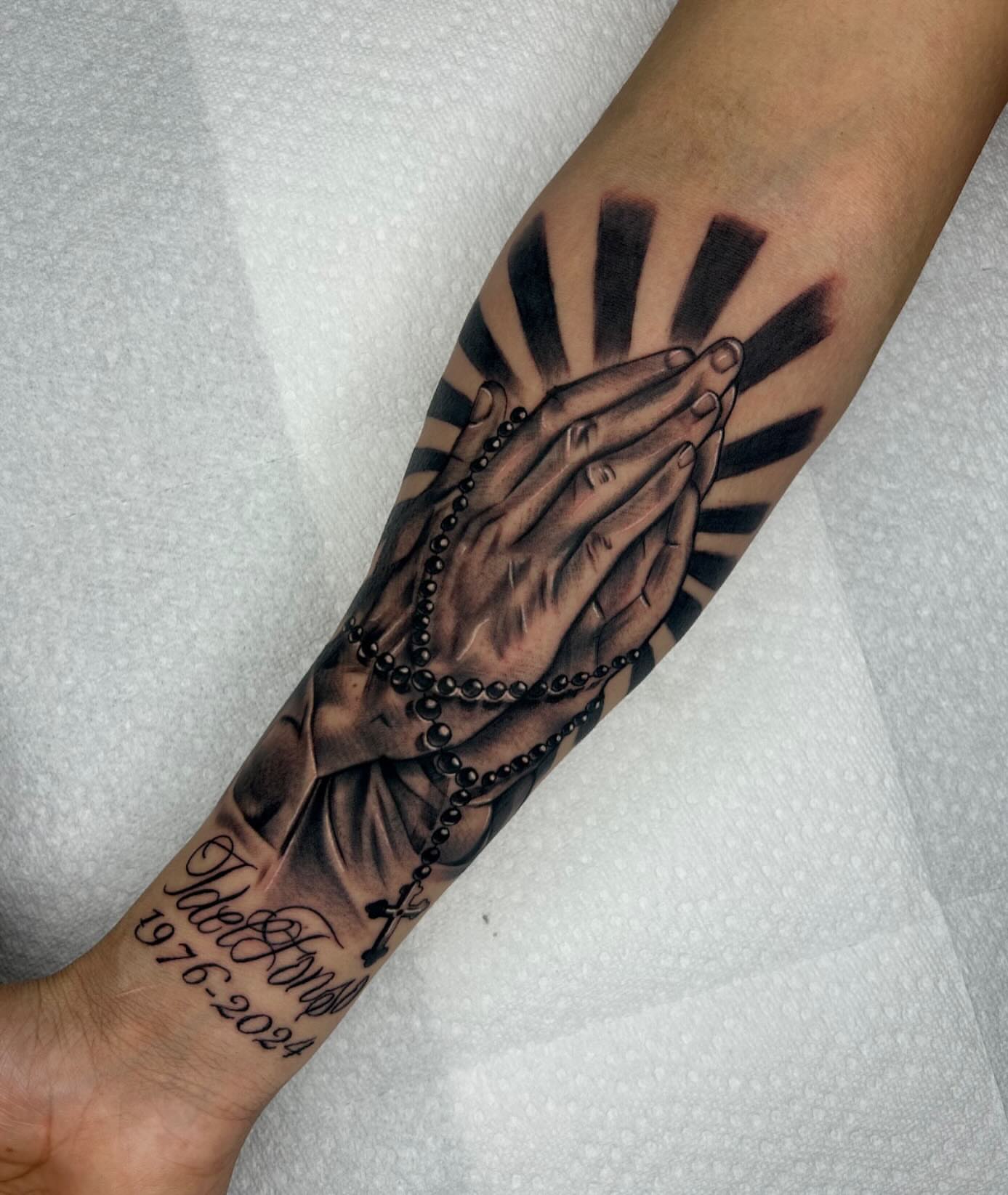 Praying hands with rosary realism tattoo on the forearm by ▪️JhonnyElias TATTOO ▪️