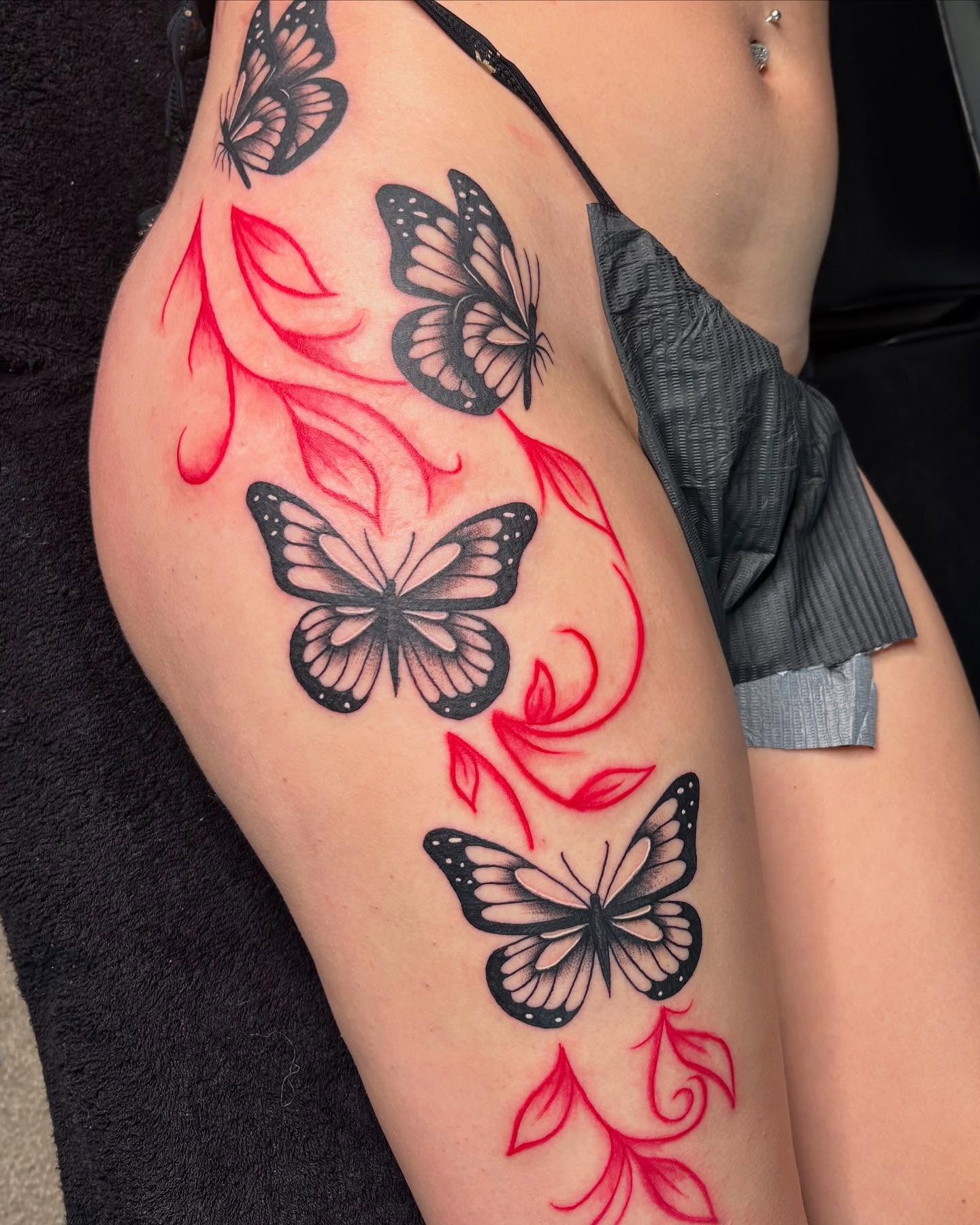 Butterflies and leaves black and grey tattoo on the thigh by Bay Area Tattoo Artist ✍🏽