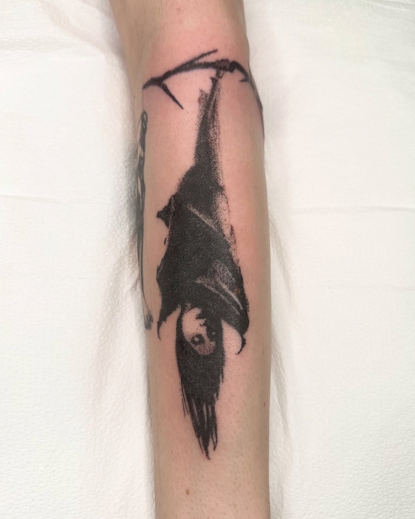 Hanging figure realism tattoo on the forearm by πΈππππππ