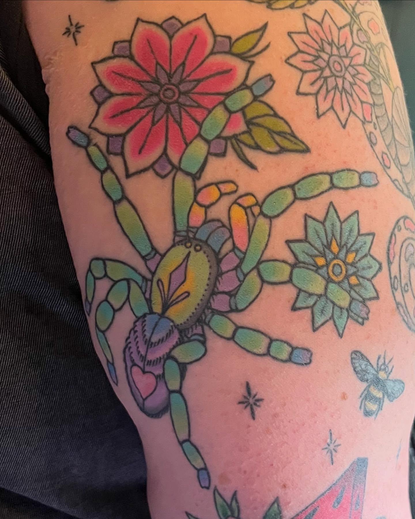 Spider and flowers American traditional tattoo on the forearm by alexandra