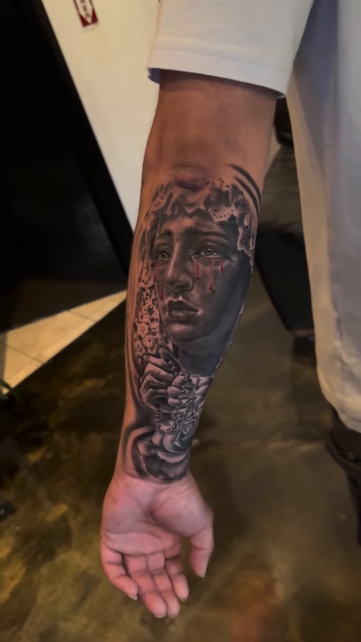 Greek statue face realism tattoo by Sergio Ramirez