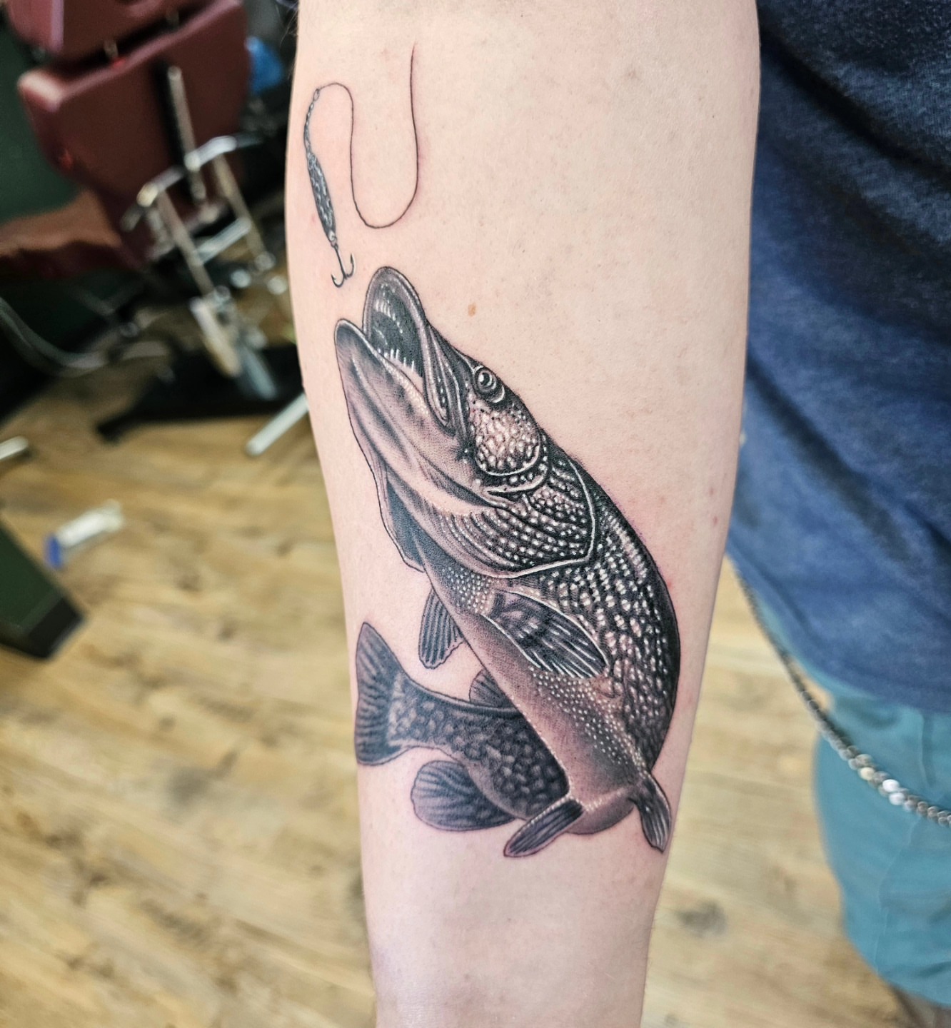 Pike realism tattoo on the forearm by Derek Davis