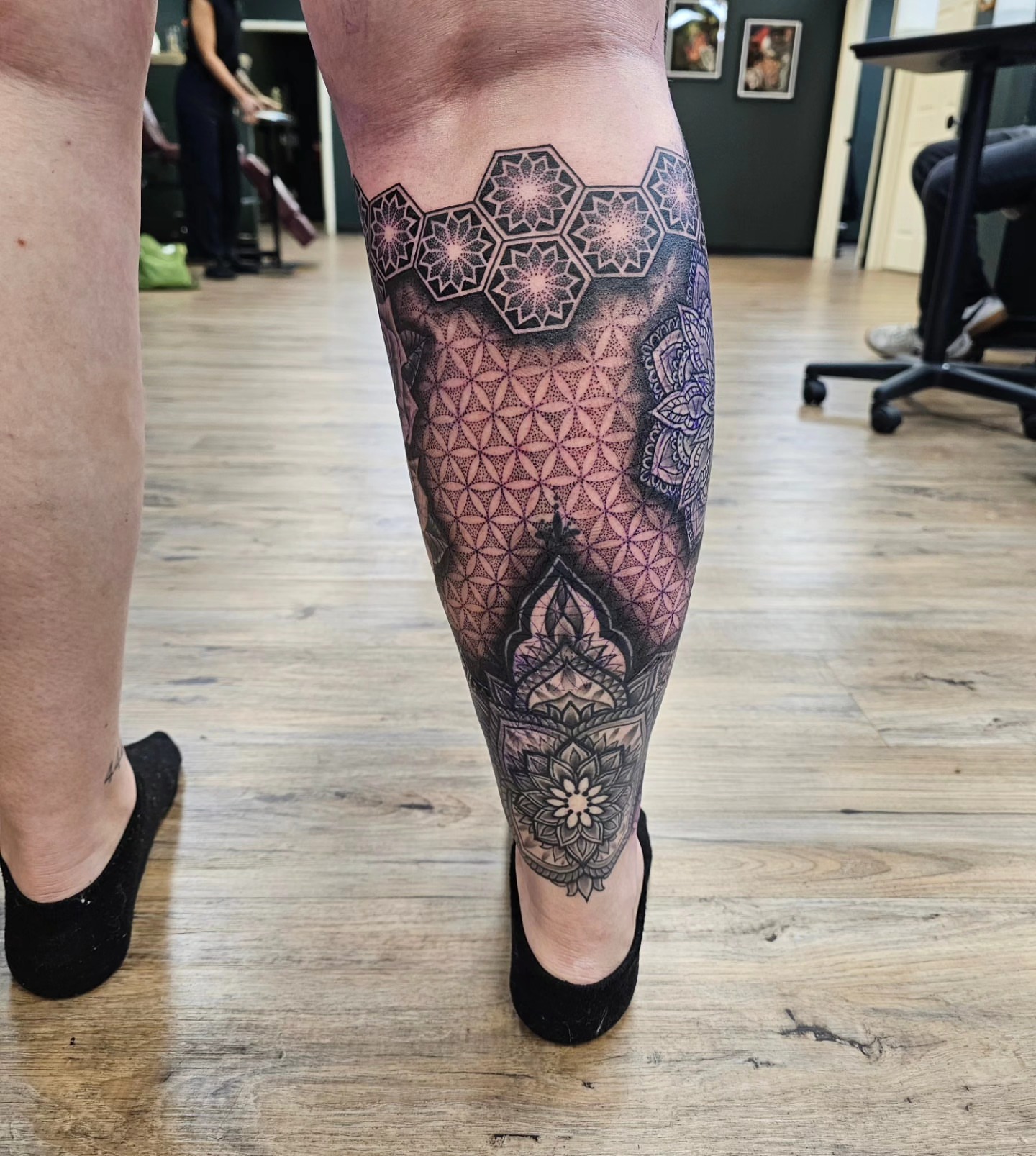 Geometric mandala geometric tattoo on the calf by Derek Davis