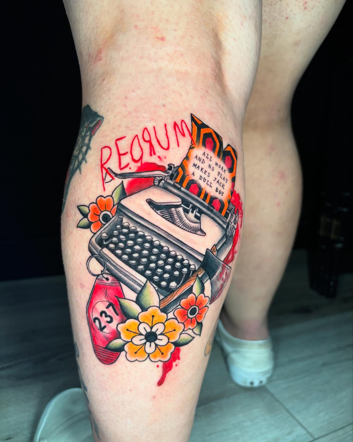 Typewriter and flowers American traditional tattoo on the thigh by Chelsey Moore, Albuquerque, New Mexico