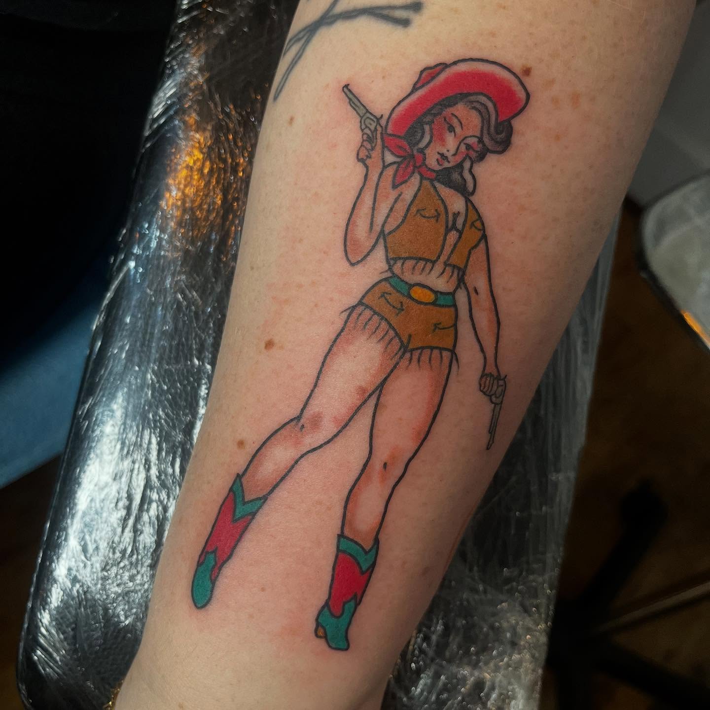 Cowgirl American traditional tattoo on the forearm by Mariah Nguyen