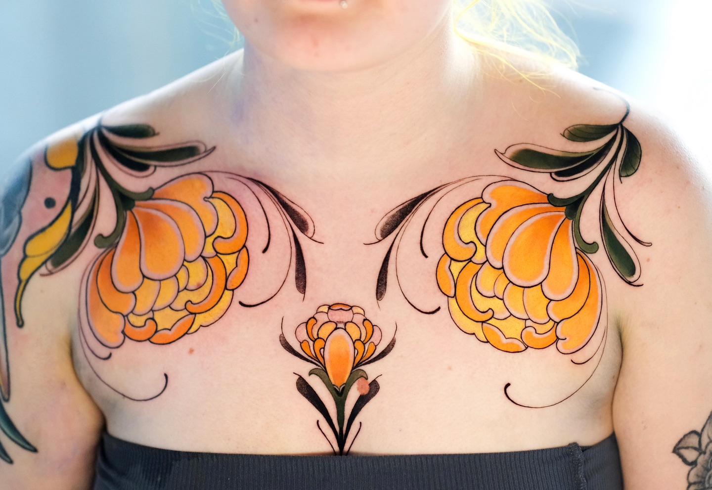 Floral American traditional tattoo on the chest by Andres Acevedo, Denver, Colorado