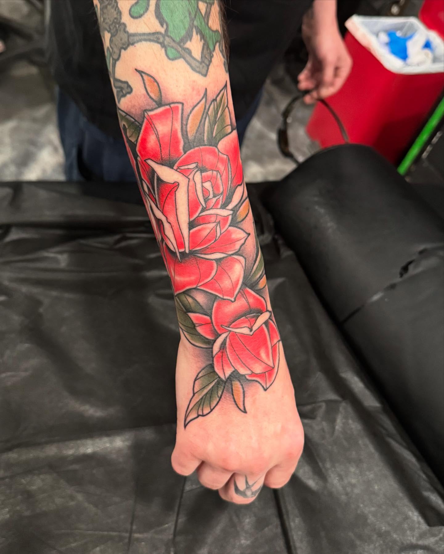 Roses American traditional tattoo on the forearm by Jay Espinoza-AZ Tattooer