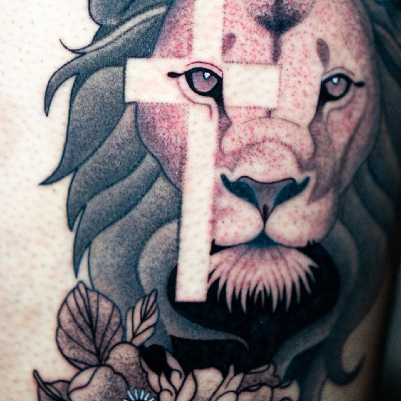 Lion realism tattoo on the forearm by Jorden Ruppe