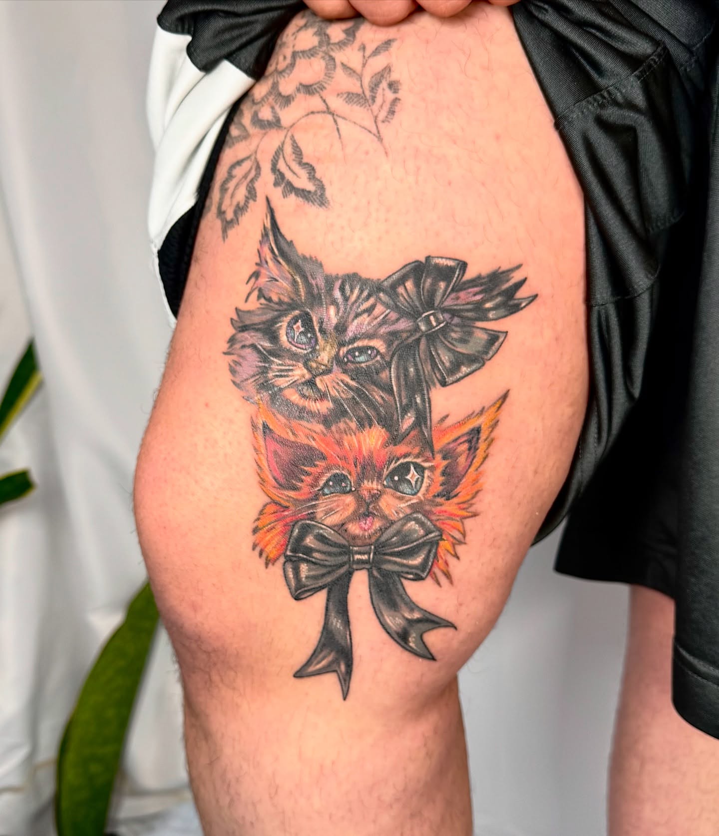 Kittens with bows American traditional tattoo on the thigh by Franky A Bonifacio, Seattle, Washington