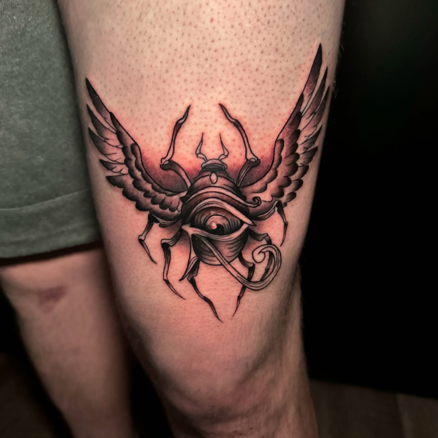 Insect with wings black and grey tattoo on the forearm by Ryland - Tattoo Artist