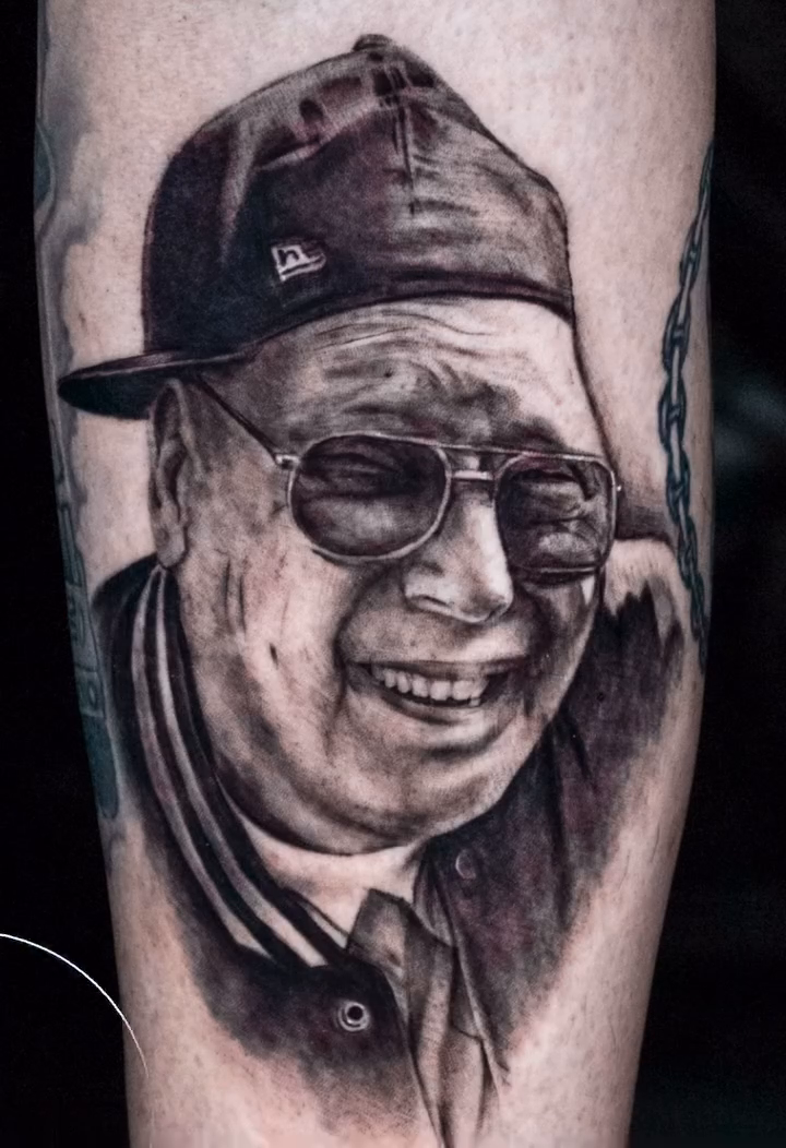 Dalai Lama portrait realism tattoo by James Jurado