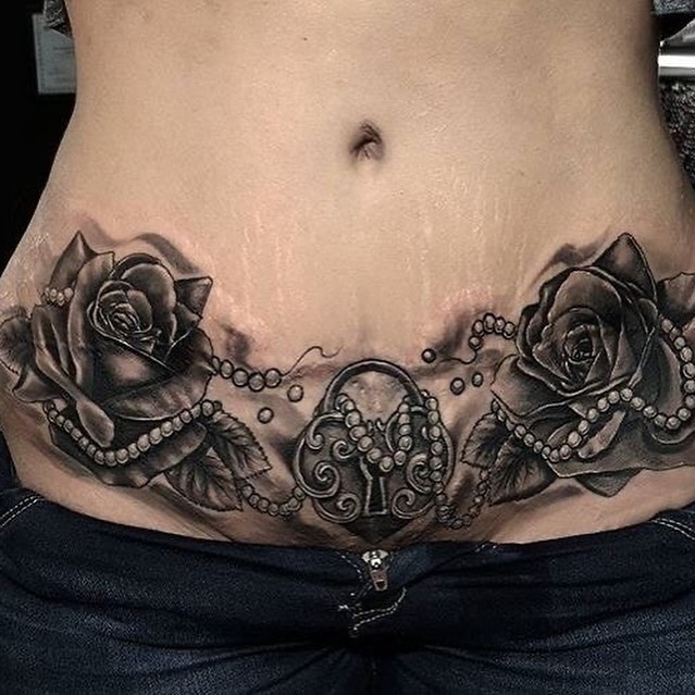 Roses and pearls realism tattoo on the torso by Jose Onasis Disla, New York, New York