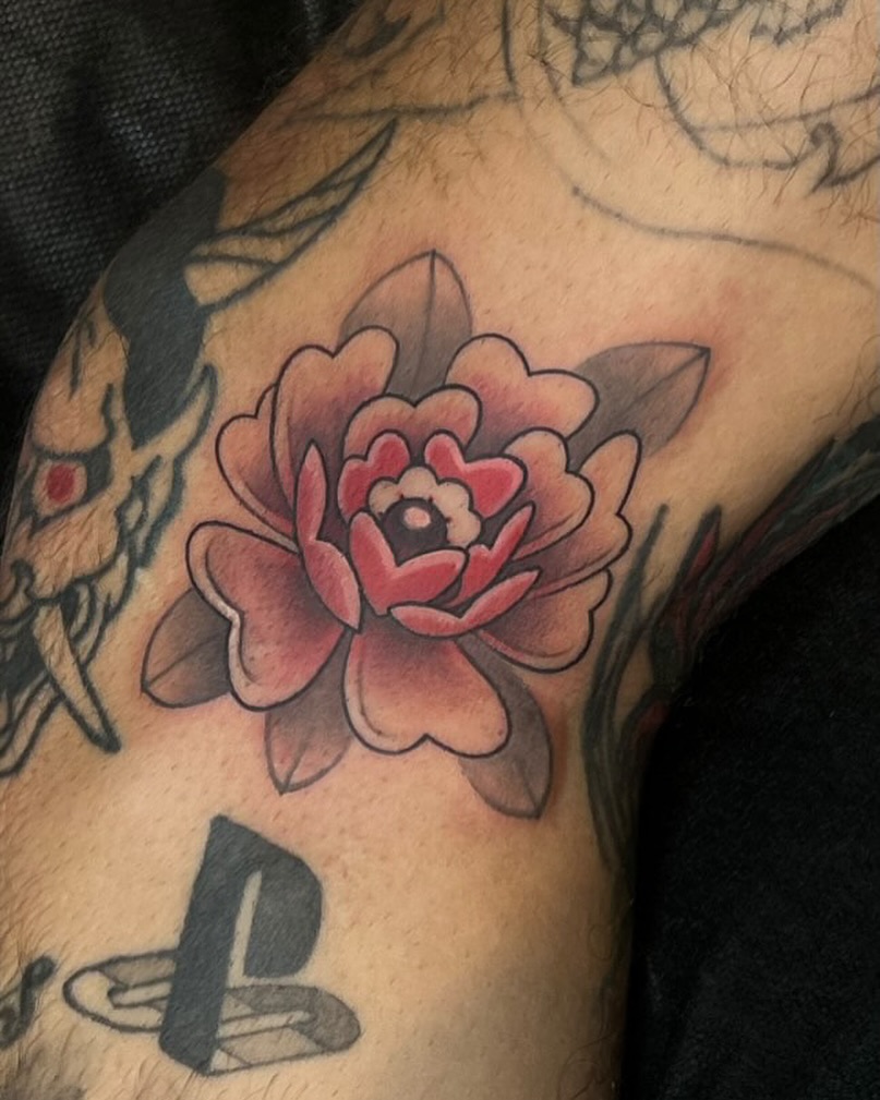 Peony realism tattoo on the shoulder by Madison Ast Tattoo