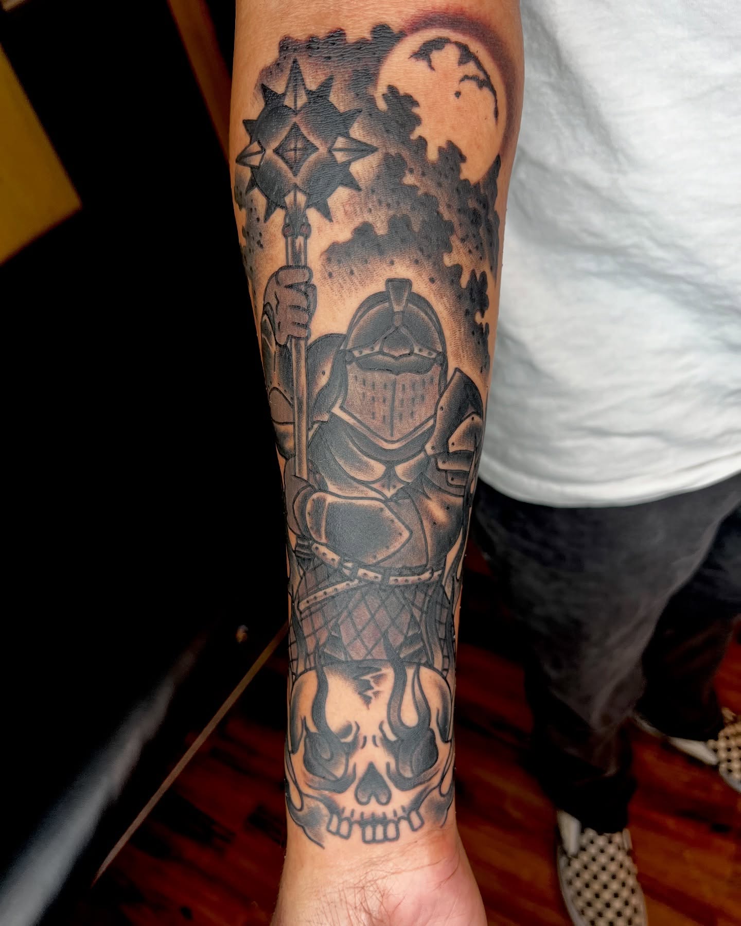 Knight with staff realism tattoo on the forearm by Cory Miller
