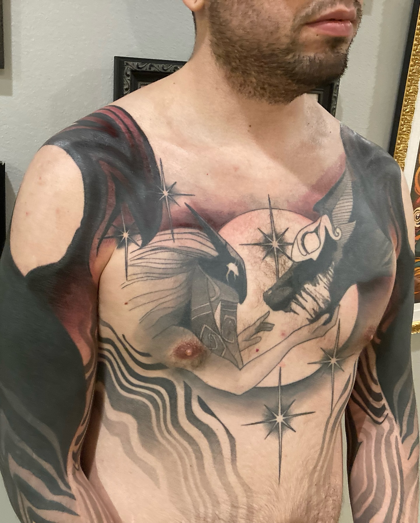 Astronaut and star realism tattoo on the chest by Rizzie D'Alterio