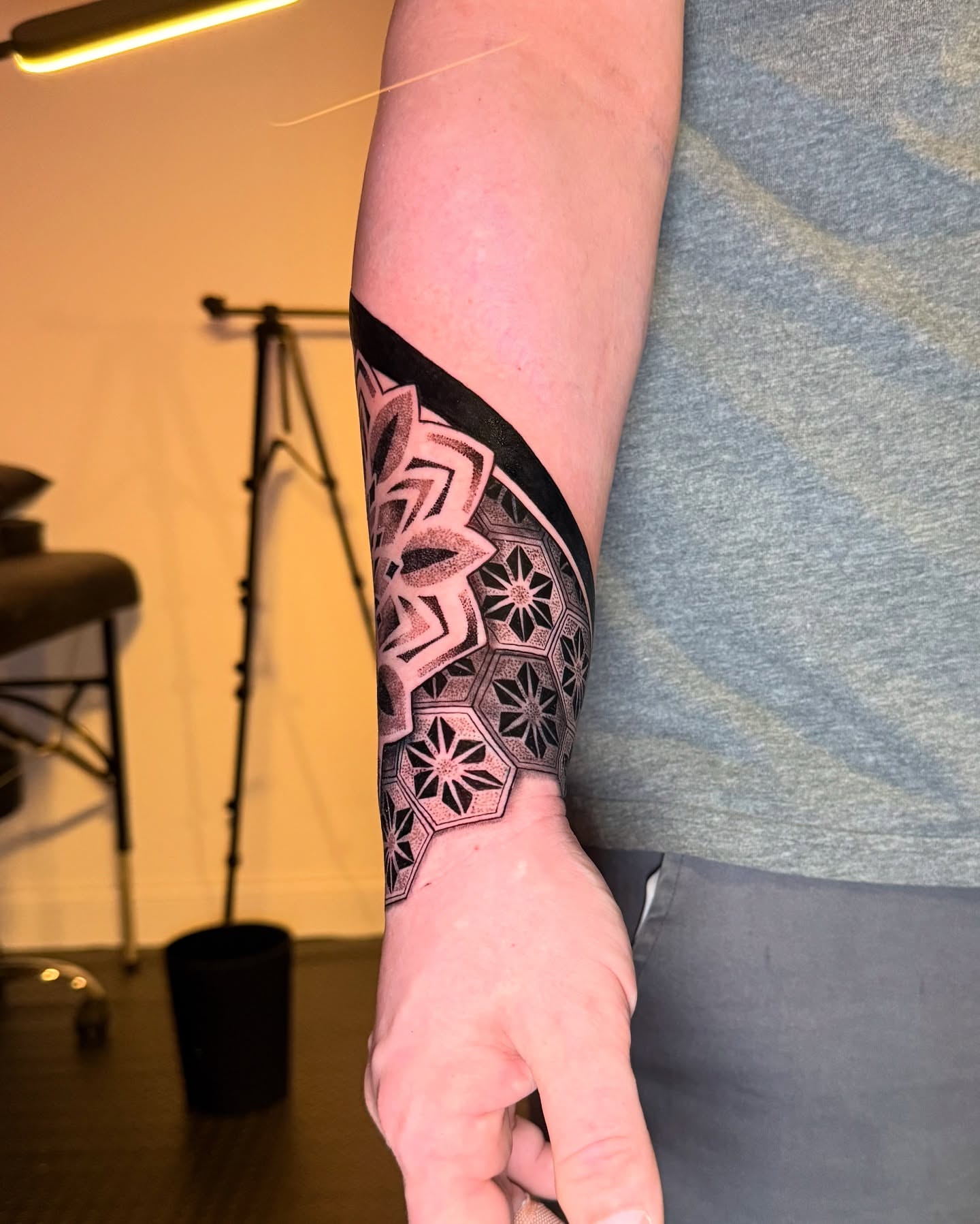 Geometric pattern geometric tattoo on the forearm by Ivy lee
