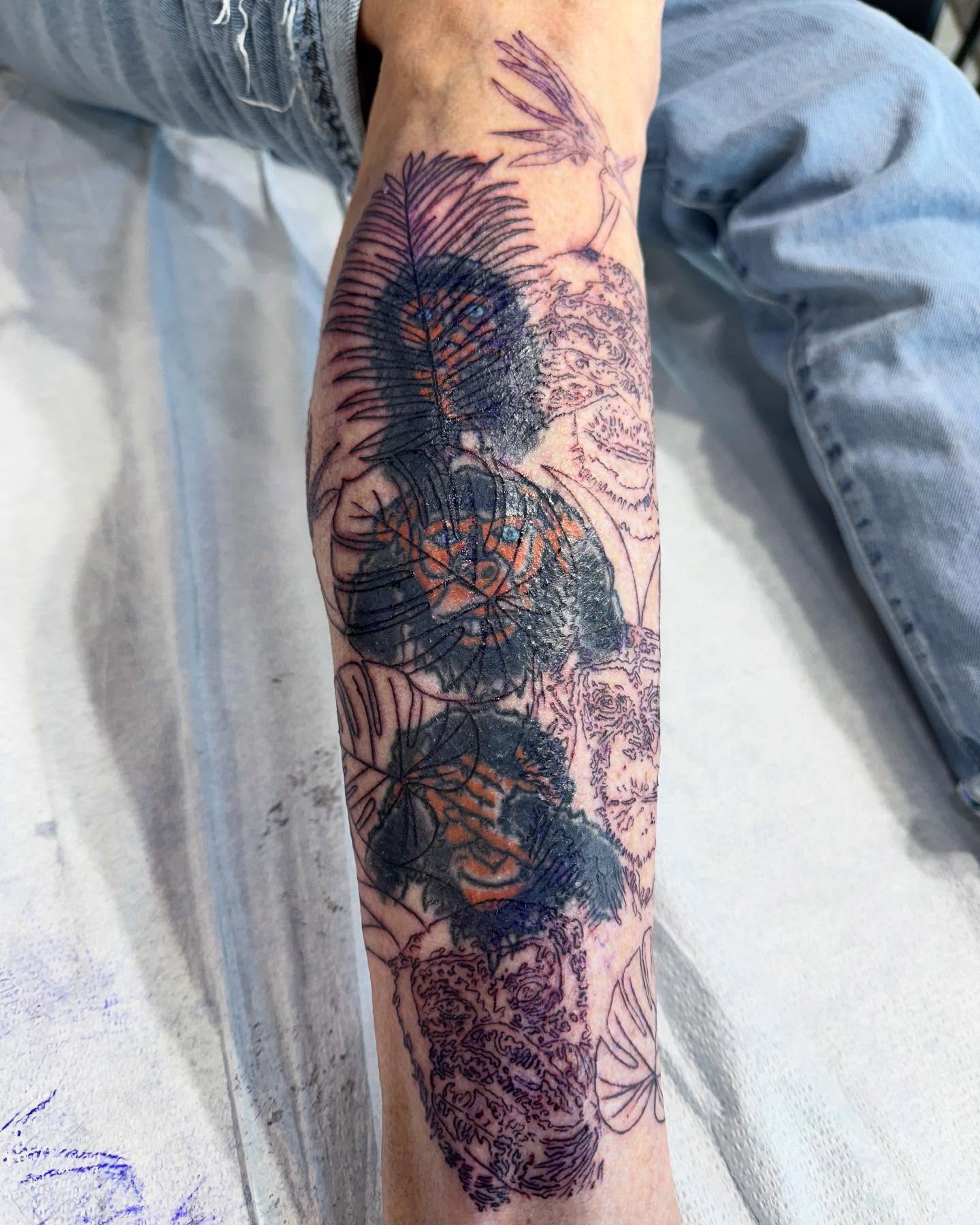 Bird and floral japanese irezumi tattoo on the forearm by Troy Butner