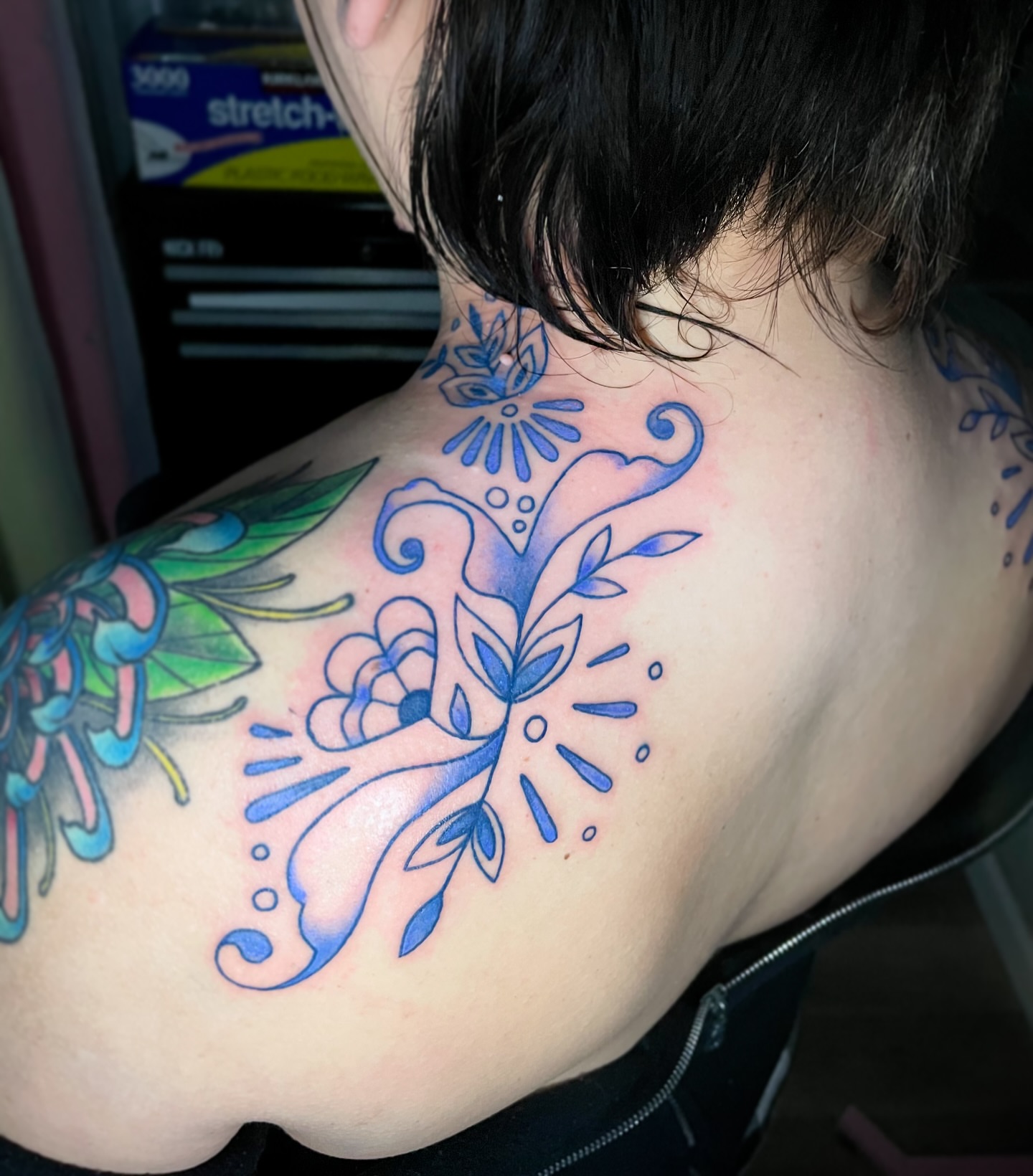 Floral design new school tattoo on the shoulder by Liv