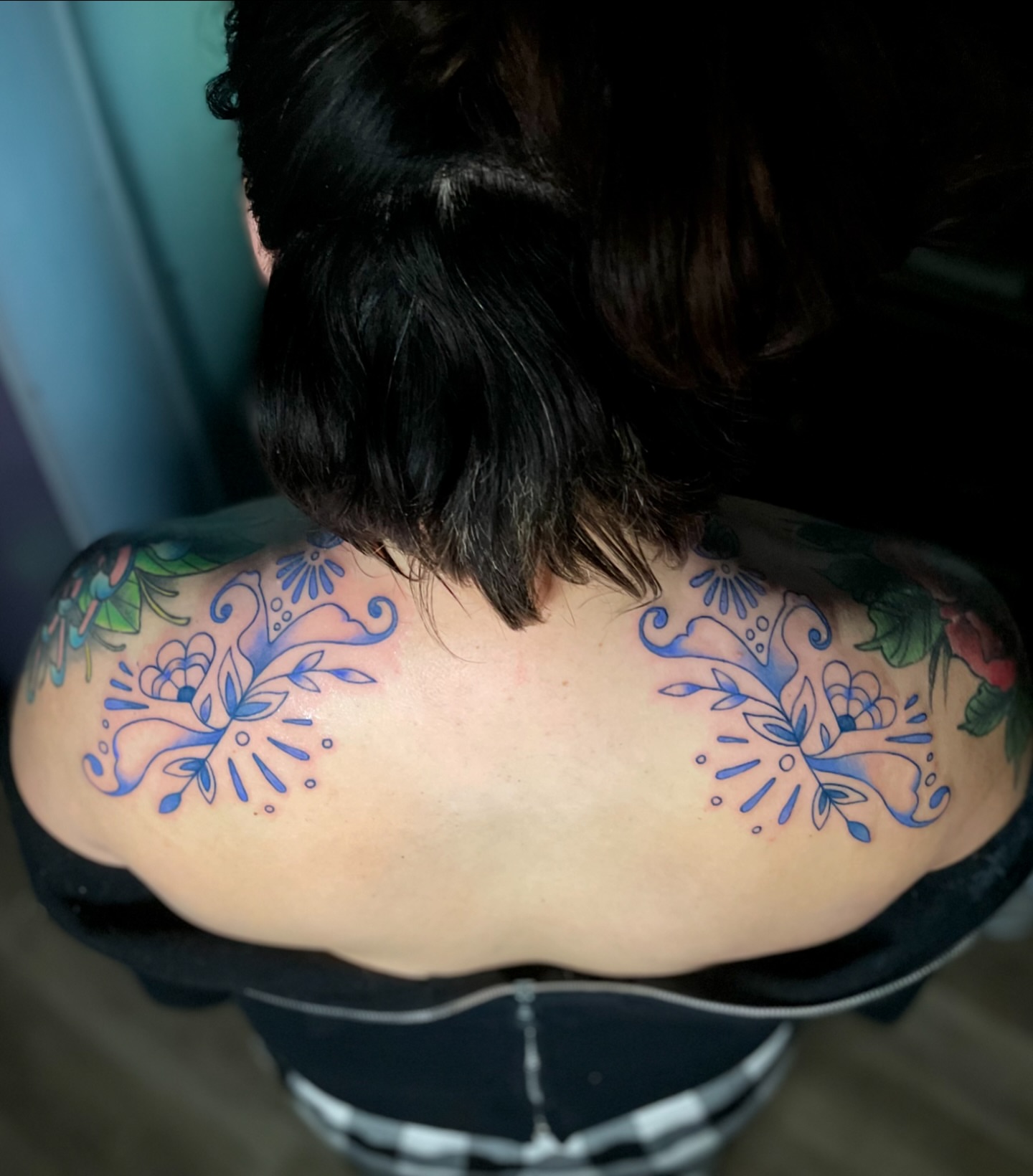 Floral design ornamental tattoo on the back by Liv