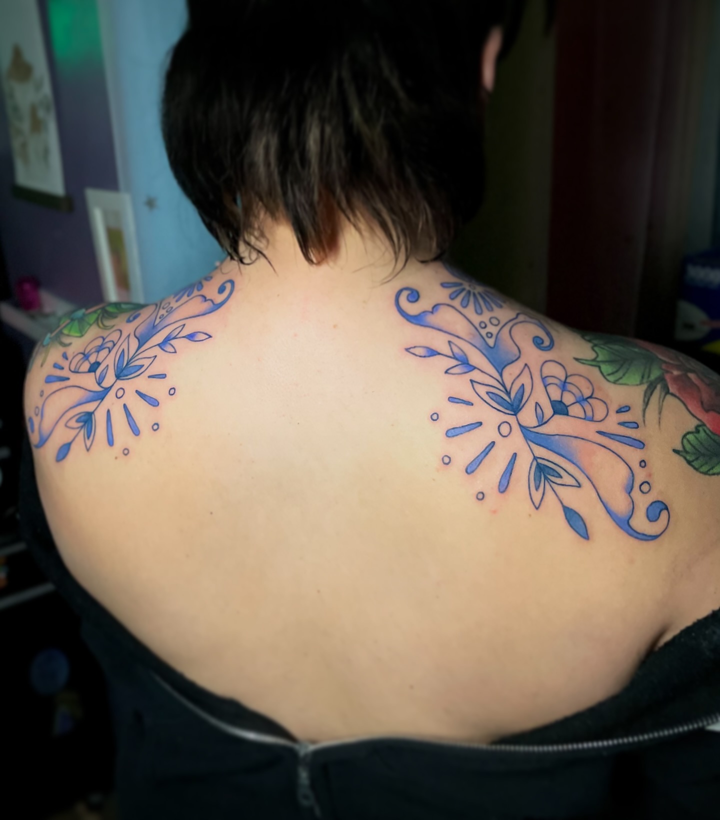 Floral design ornamental tattoo on the back by Liv