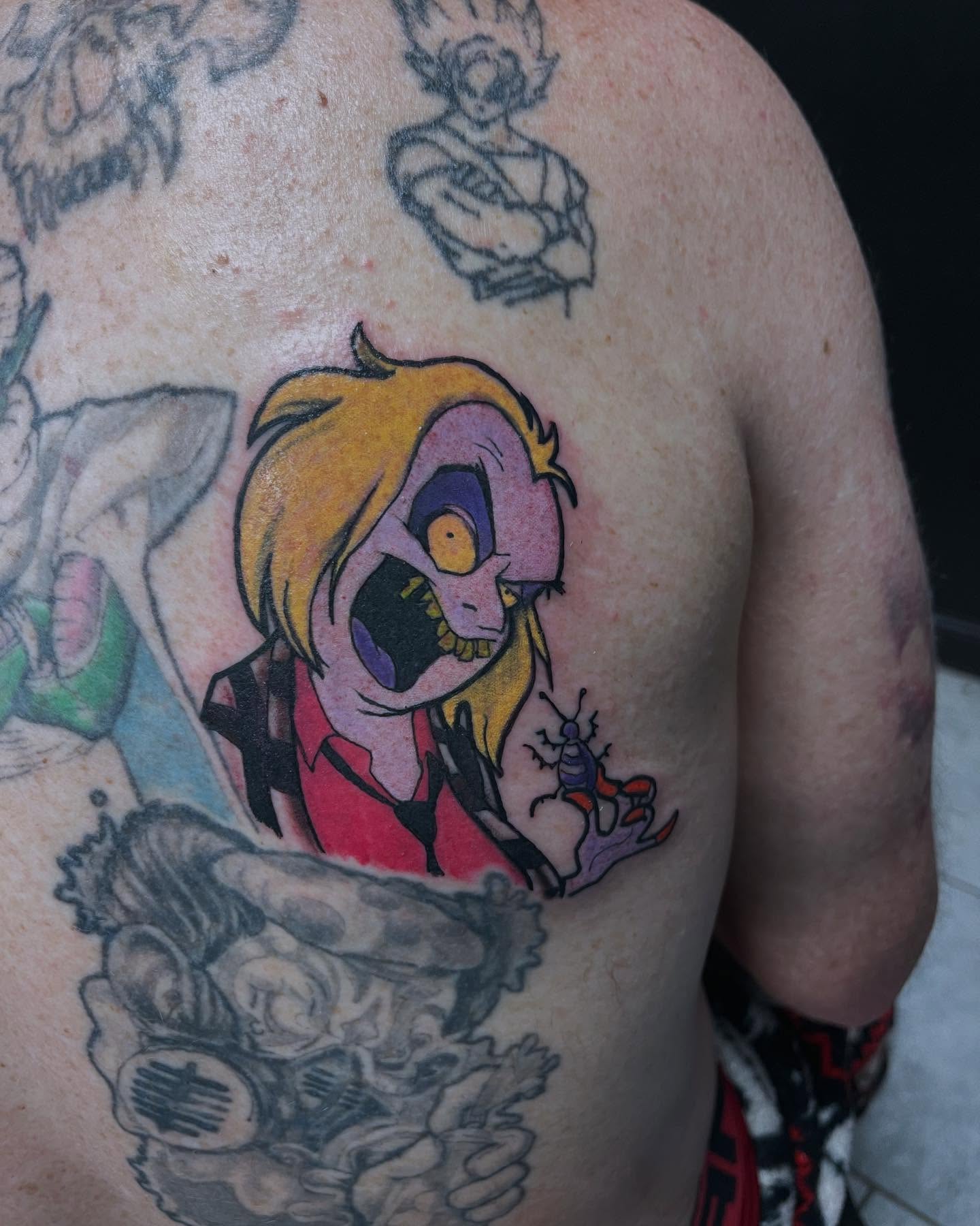Anime character anime tattoo on the chest by Markeith “Black Jesus” Heard