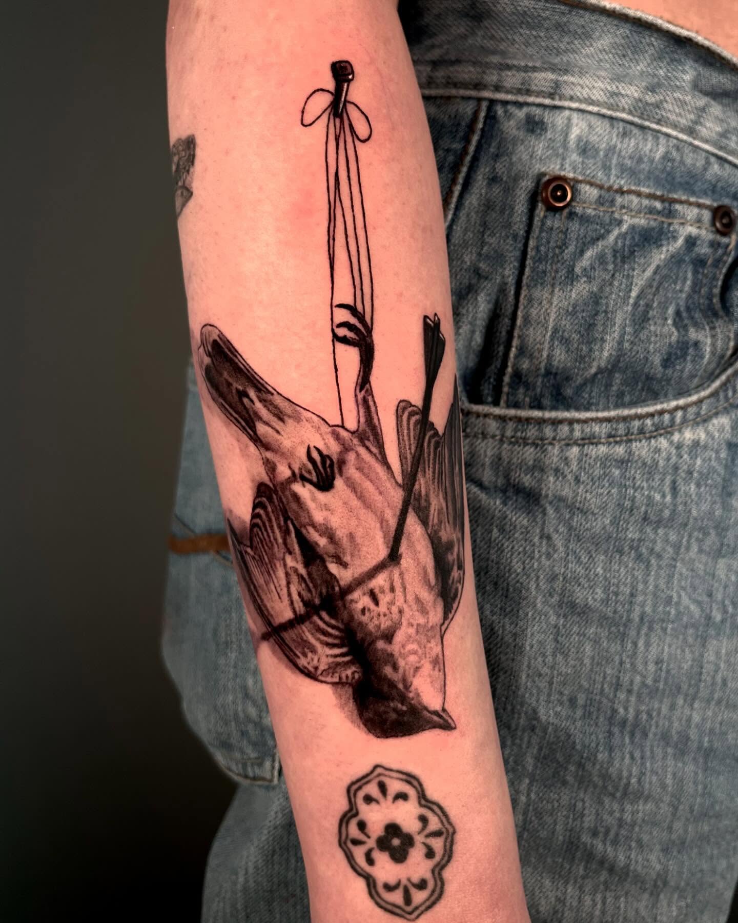 Tattoo by @jiinkytattoos — black_and_grey, realism