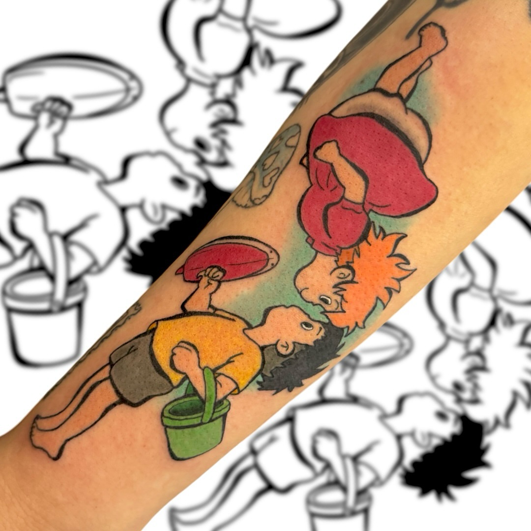 Calvin and Hobbes American traditional tattoo on the forearm by Victor Campos