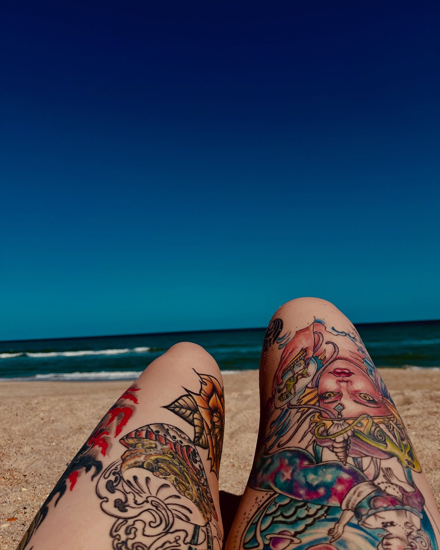 Sea creature and woman new school tattoo on the leg by Stevie Reign
