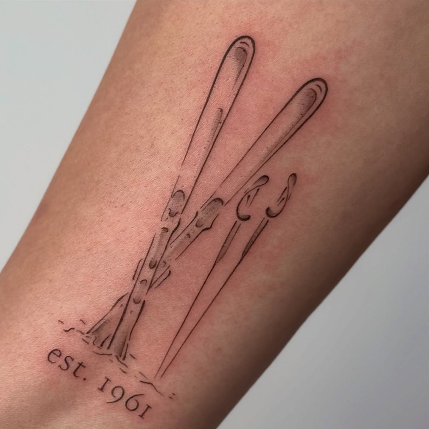 Baseball bats black and grey tattoo on the forearm by bre