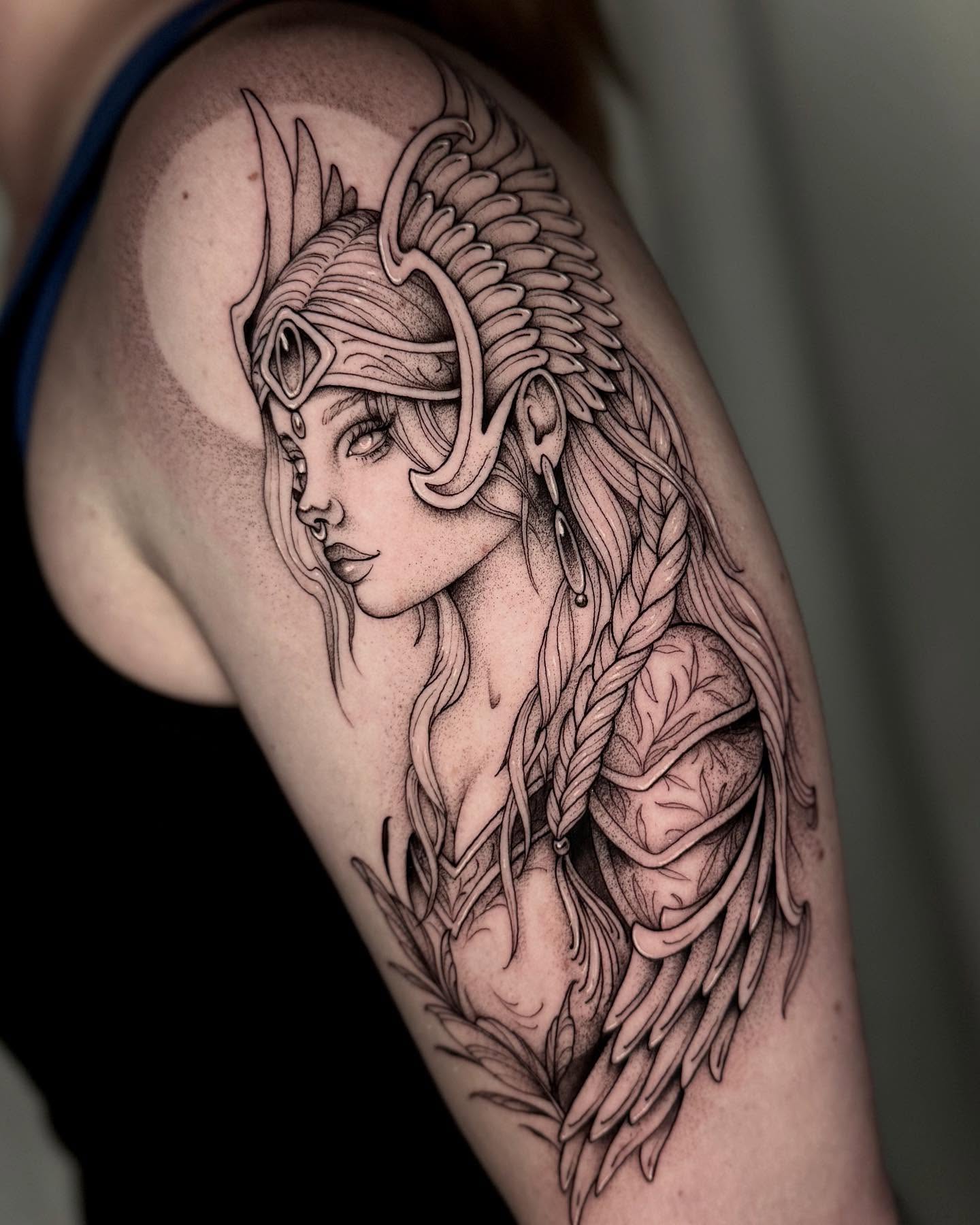 Female warrior realism tattoo on the shoulder by Kathryn Semus