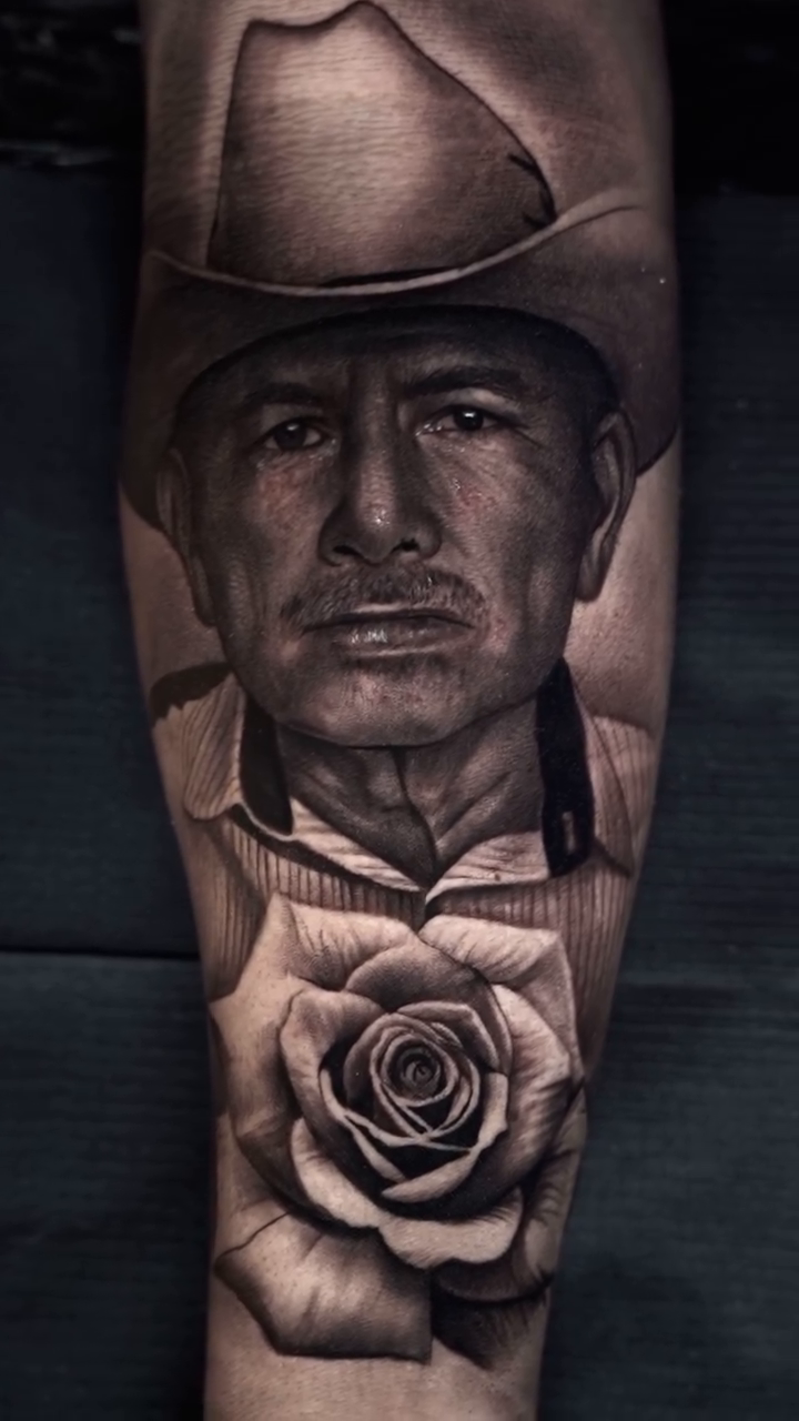 Man and rose realism tattoo by Risa