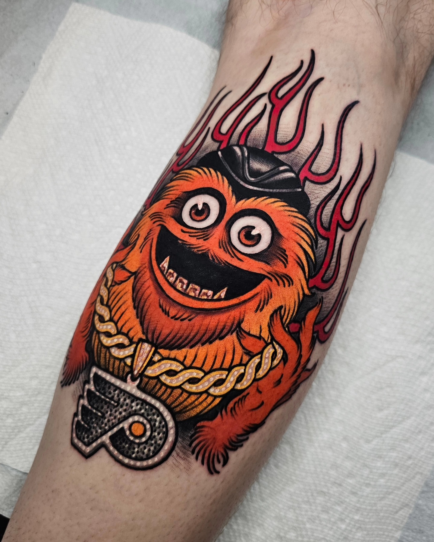 Monster American traditional tattoo on the forearm by Shannon