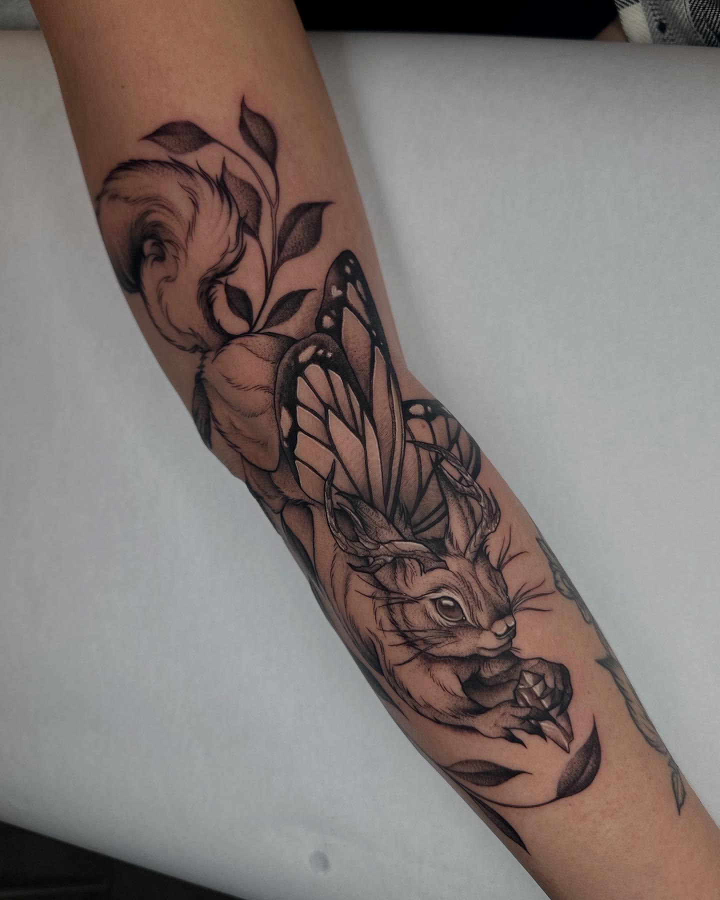 Rabbit and butterfly realism tattoo on the forearm by ᴇʟɪᴢᴀ ɢᴏɴᴢᴀʟᴇᴢ