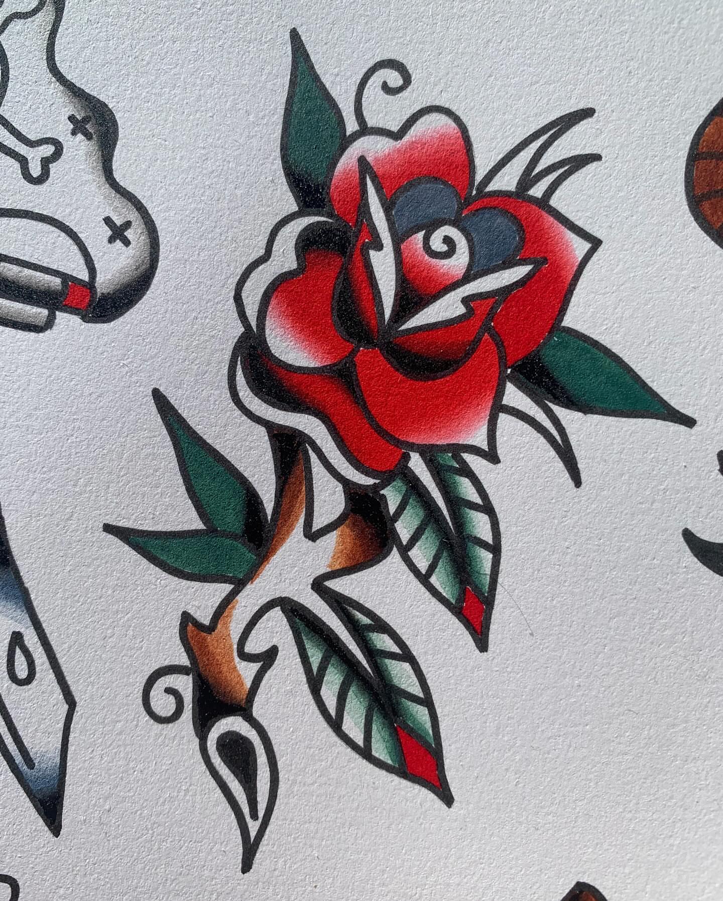 Red rose American traditional tattoo by ellie