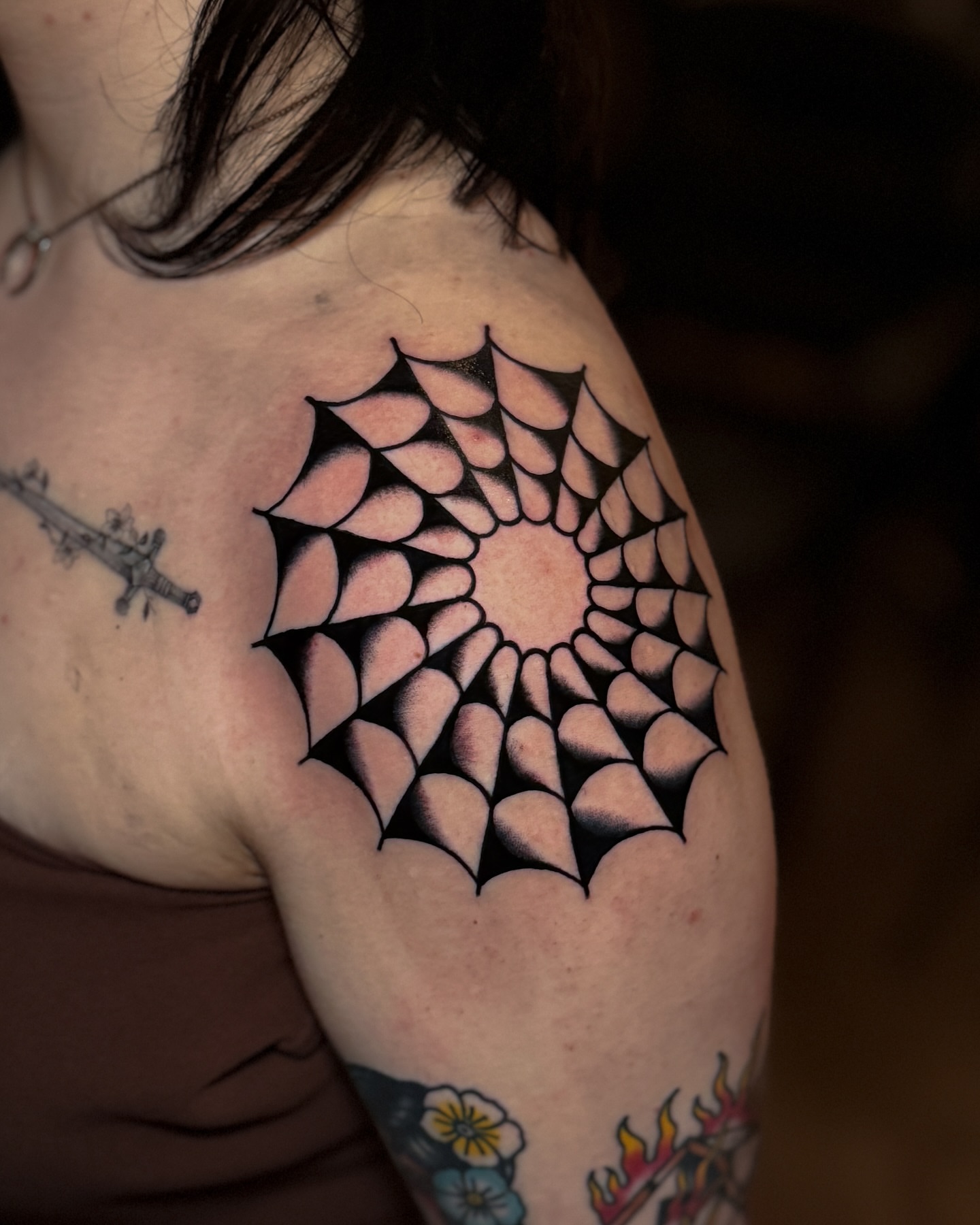 Spiral web geometric tattoo on the shoulder by οΌππ¨ππ¨οΌ, New York, New York