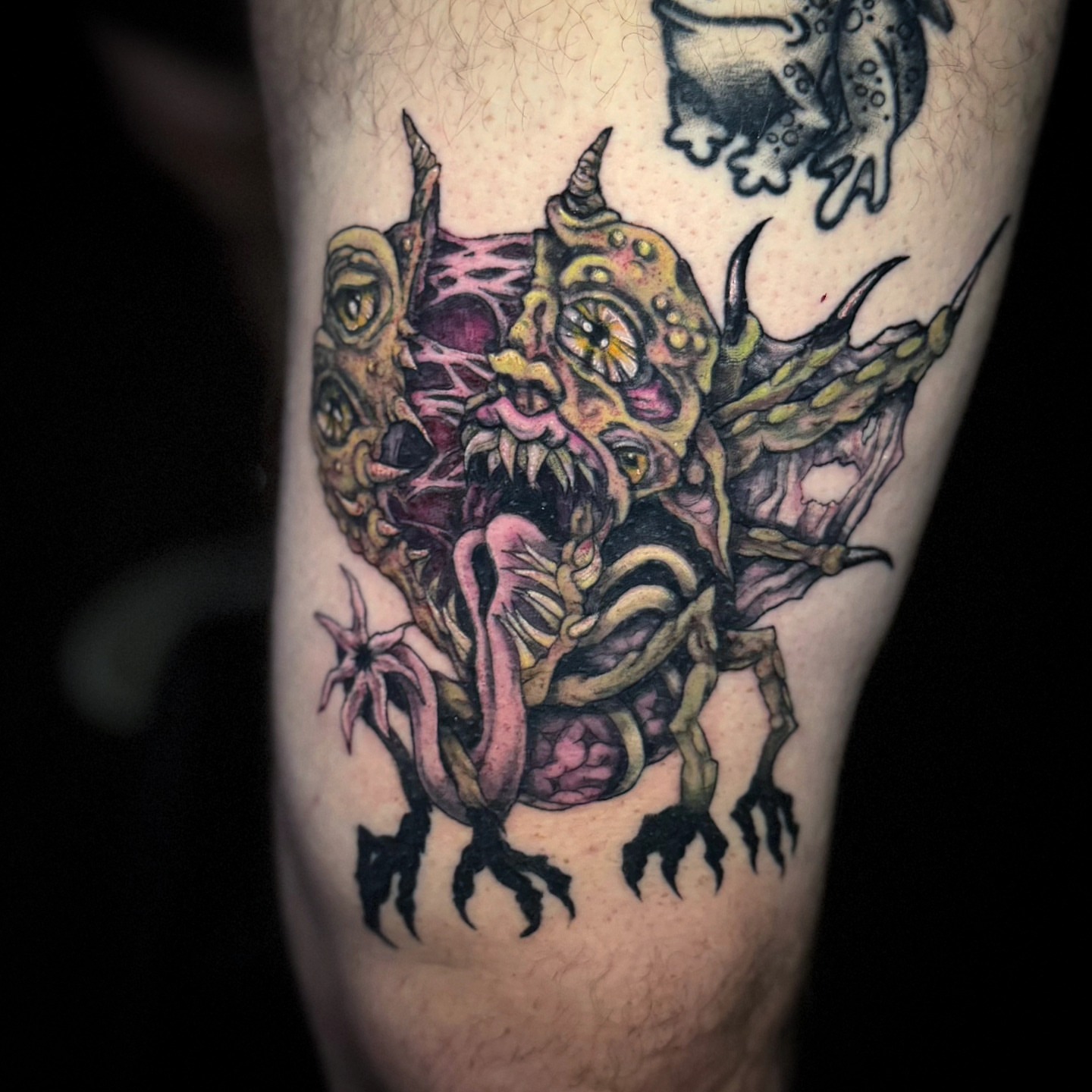 Monster dark realism tattoo on the forearm by Jennalea